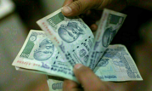 Indian bond yields end a tad higher on week amid worries over oil surge