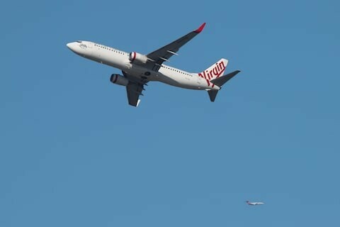 Virgin Australia shares surge 8.3% on trading debut