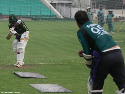 22 cricketers taking part in training session