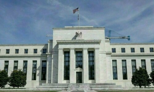 Fed set to hold rates steady in the face of Trump pressure