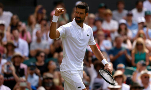 Djokovic hits century to lead veterans into last 16, Krejcikova crashes
