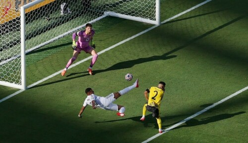Real Madrid survive Dortmund scare to reach Club World Cup semis