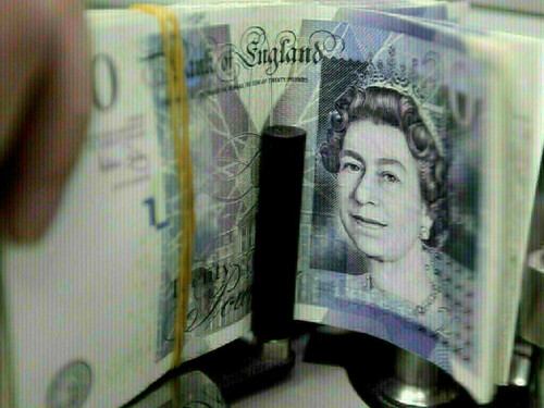 Sterling slips as weak growth data fuels rate cut expectations