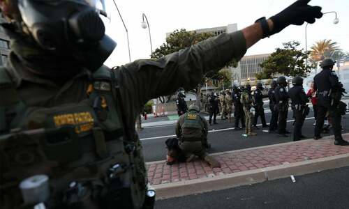 US officials defend immigration raid tactics