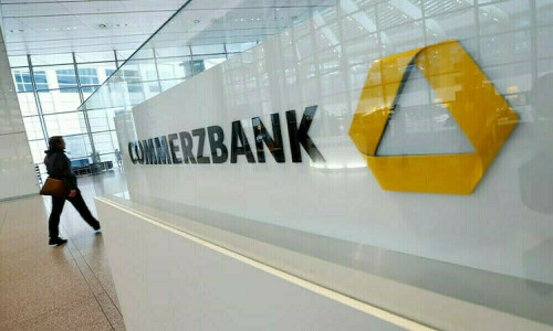 Commerzbank posts profit drop on restructuring costs but raises targets