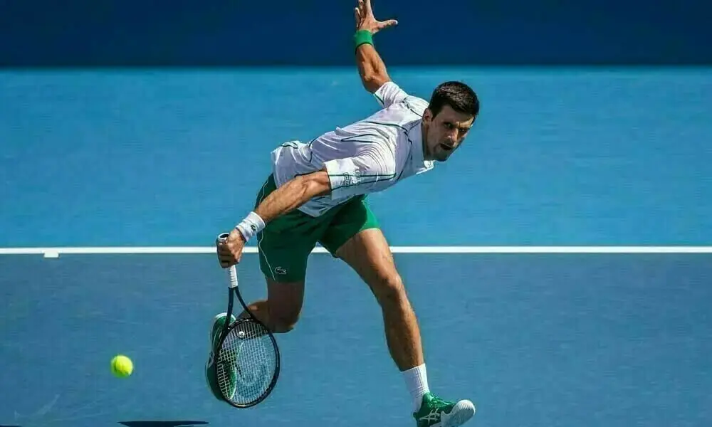 Djokovic battles past Tien to reach US Open second round Djokovic battles past Tien to reach US Open second round