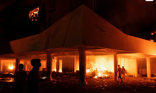 Three dead as Indonesian protesters set fire to regional parliament building