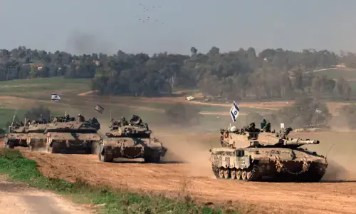 Gaza hit by telecoms blackout as Israeli tanks advance