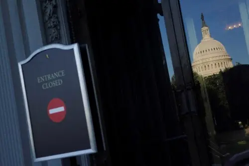 White House freezes funds for Democratic states in shutdown slap