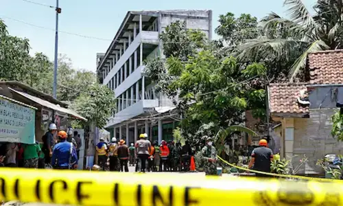 Indonesia ends search for victims of boarding school collapse, 61 dead