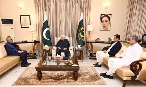 President Zardari discusses national, global issues with Ishaq Dar