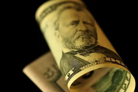 Dollar under pressure on Fed rate cut bets, China trade tensions