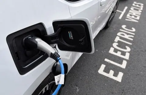 Global EV sales hit record 2.1 million in September, research firm says