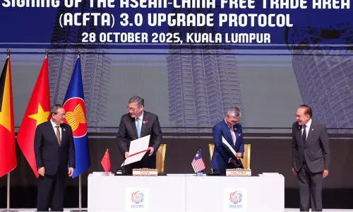China and ASEAN, hit by US tariffs, sign upgraded free trade pact