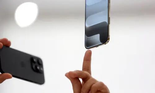 Apple CEO forecasts holiday quarter iPhone sales that top Wall Street estimates