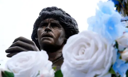 Maradona statue rides through Naples as city remembers Argentine great