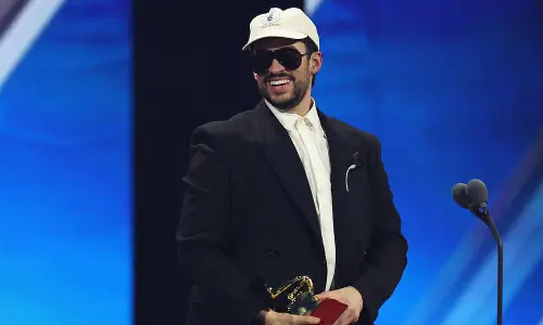 Bad Bunny wins top album prize at Latin Grammys in Vegas Bad Bunny wins top album prize at Latin Grammys in Vegas