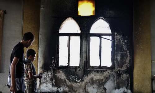 Israeli troops kill two Palestinians, settlers set mosque ablaze