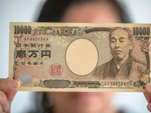 Yen rises on Ueda comments; dollar braces for crucial December