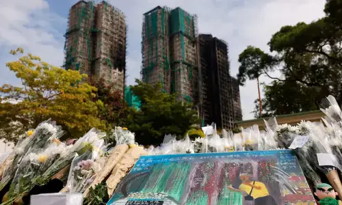 Hong Kong apartment fire toll hits 159, infant among dead