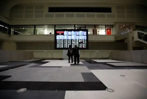 Japan’s Nikkei skids in subdued Asia as bets of rate hike grow