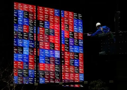 Asian stocks slip as nervy markets wait for Fed