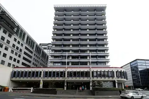 NZ central bank expects cash rate to remain at current level for some time