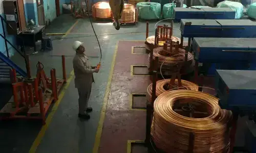 Copper hovers near record high on weaker dollar and supply outlook Copper hovers near record high on weaker dollar and supply outlook