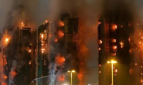 China warns foreign media in Hong Kong over fire coverage