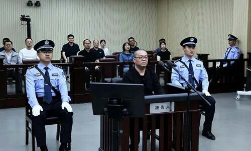 China executes former senior banker for taking $156m bribes