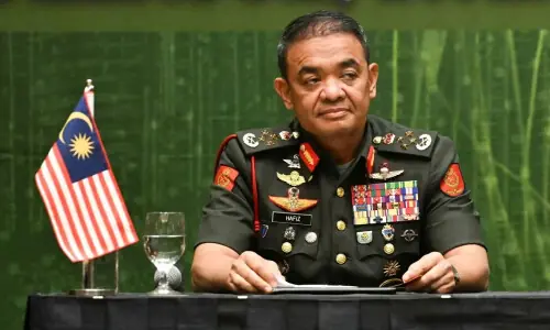 Malaysian ex-army chief detained in military procurement graft probe