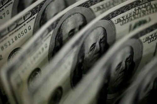 Dollar pares gains, yen tumbles