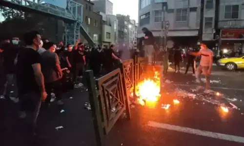 At least 5,000 dead in Iran unrest, official says, as judiciary hints at executions