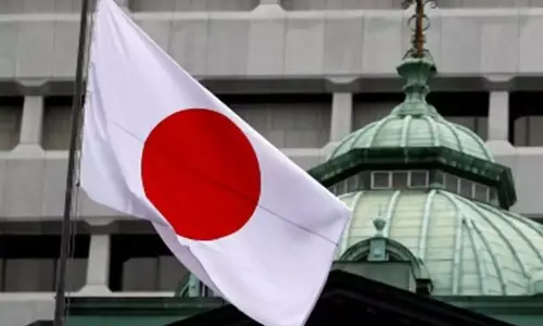IMF revises up Japan&rsquo;s growth forecast, sees inflation moderating
