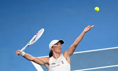 Iga Swiatek sees off Bouzkova to reach Australian Open third round