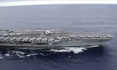US deploys aircraft carrier as Iran warns against attack