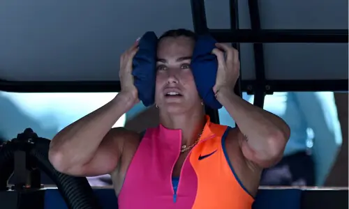 Organisers invoke extreme heat policy on hottest day at Australian Open