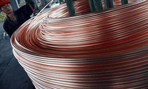 Copper falls on stronger dollar and inventories outlook
