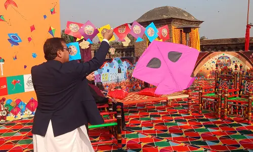 Colour and caution as banned kite-flying festival returns to Pakistan