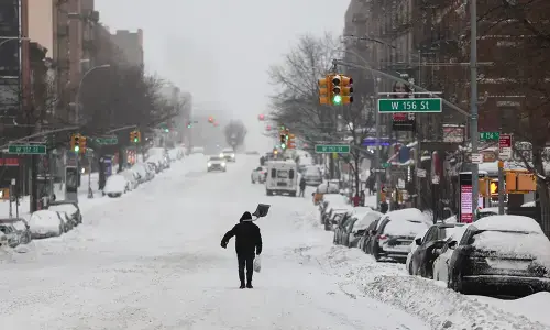 Powerful winter storm shuts schools, disrupts travel across US Northeast