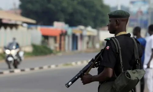 Gunmen kill at least 25 in twin attacks in Nigeria