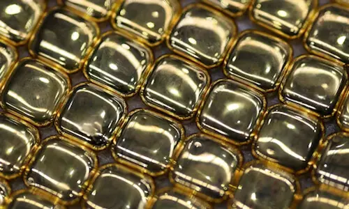 Gold steady as investors eye US-Iran talks, brace for inflation data