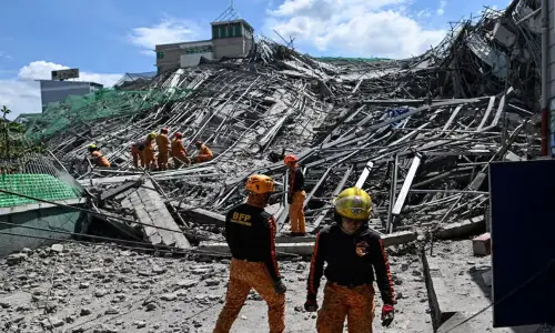At least one dead in Philippine building collapse At least one dead in Philippine building collapse