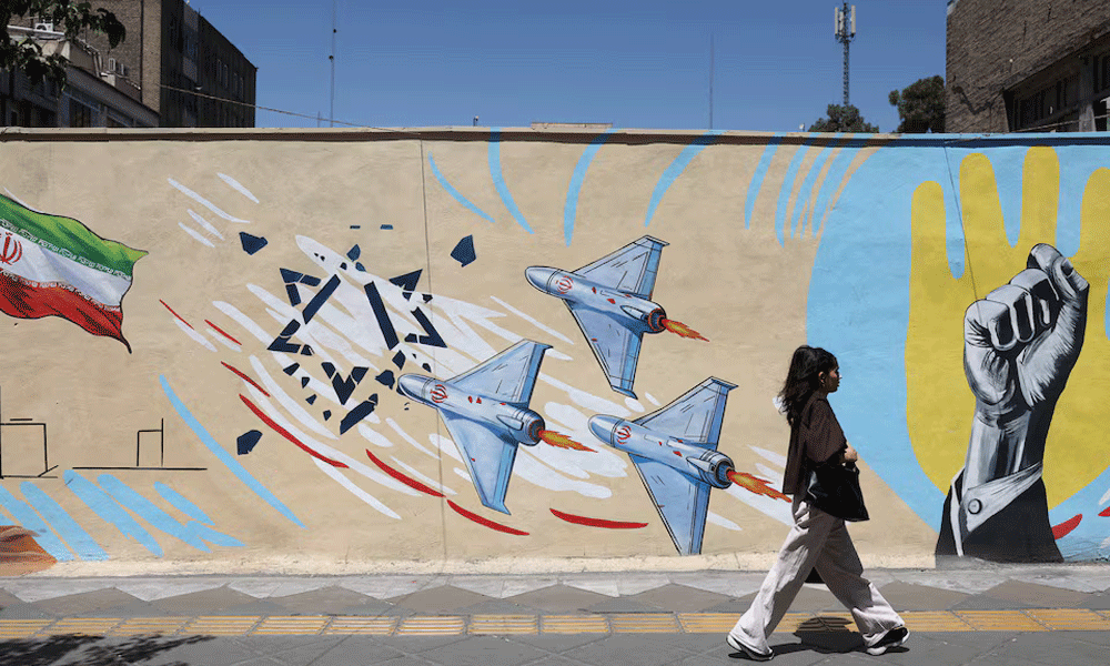 US says it struck Iranian military sites, Tehran responds with air base attack