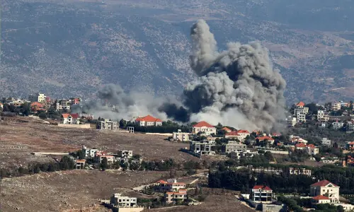 Israel strikes south Lebanon after holding off Beirut attack