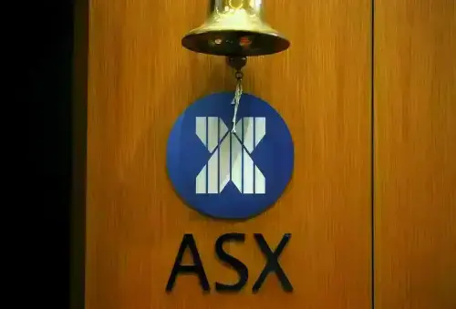 Australia shares climb to near one-month high as miners rally