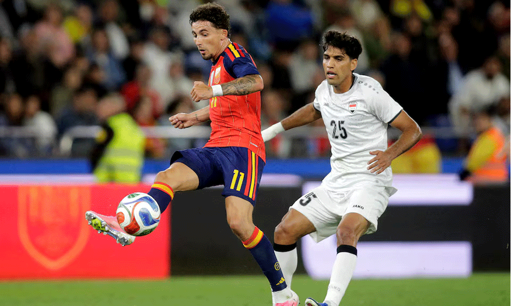Second-string Spain held by Iraq in low-key World Cup send-off