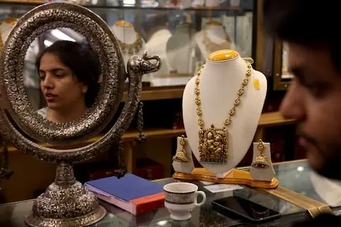 Gold hits over 6-month low on rate-hike concerns amid Mideast conflict
