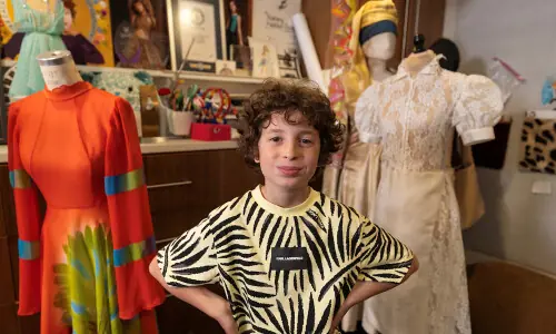 Ten-year-old American fashion designer shuttles between school and runways