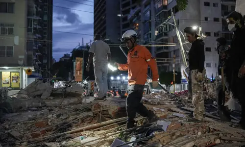 Venezuela twin quakes kill at least 164, topple buildings